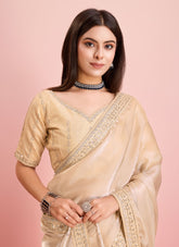Embroidered functional wear saree in beige colour
